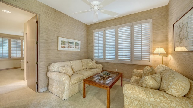 living room featuring ceiling fan and carpet floors