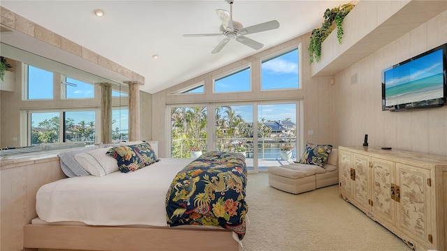 bedroom featuring ceiling fan, lofted ceiling, light carpet, and access to outside