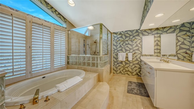 bathroom featuring walk in shower, vanity, and tile patterned flooring