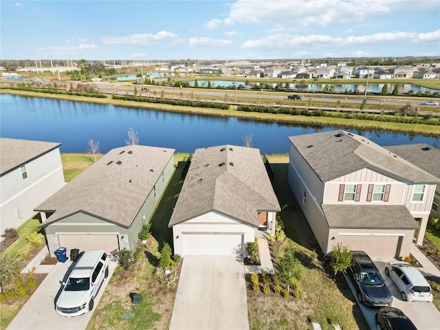 bird's eye view with a water view