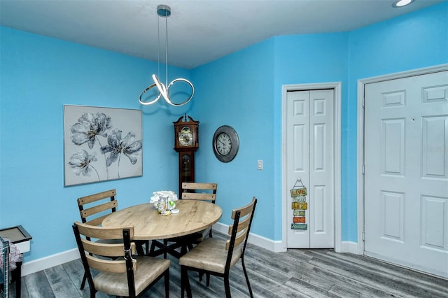 dining space featuring hardwood / wood-style flooring