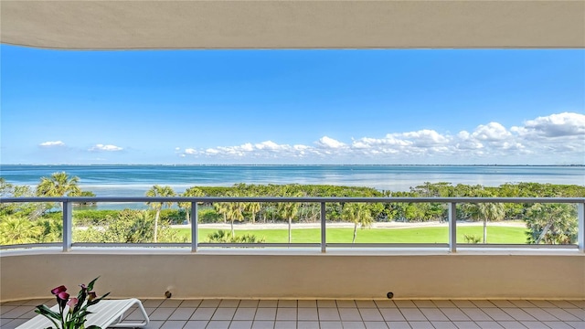 balcony featuring a water view