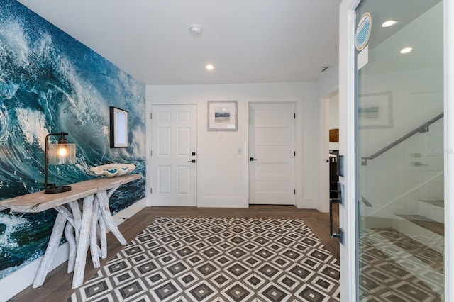 entryway with hardwood / wood-style flooring