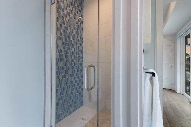 bathroom featuring an enclosed shower