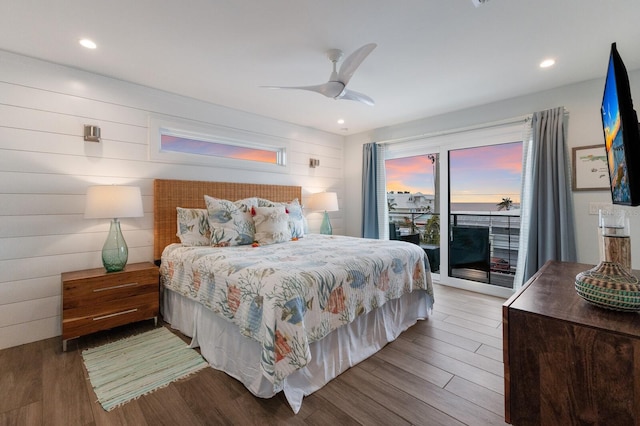 bedroom with ceiling fan, access to exterior, and hardwood / wood-style floors