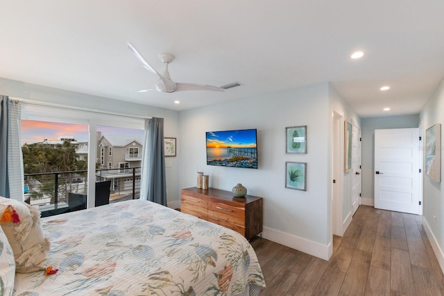 bedroom with ceiling fan, access to outside, and dark hardwood / wood-style floors