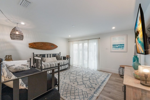 living room with light hardwood / wood-style floors