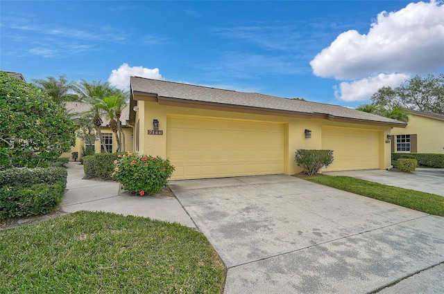 view of side of home featuring a garage