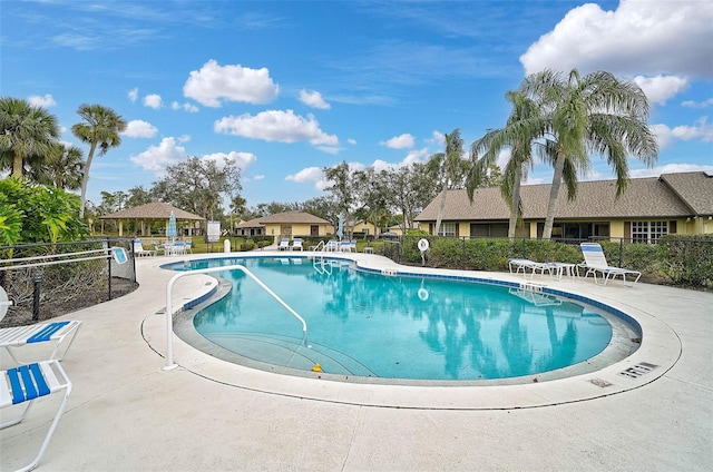 view of pool featuring a patio