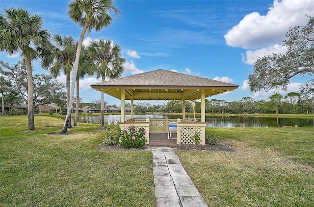 view of yard with a gazebo and a water view