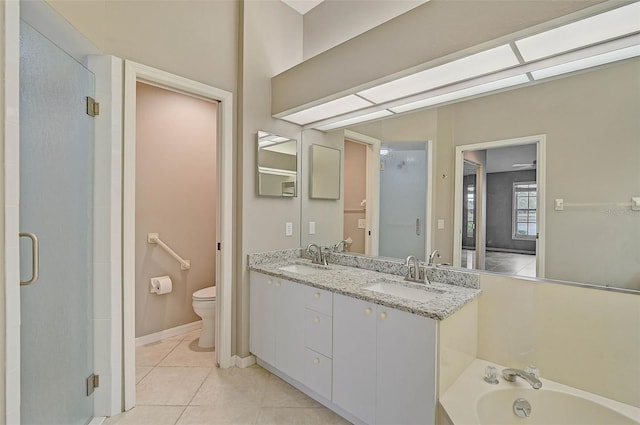 full bathroom featuring toilet, vanity, tile patterned flooring, and plus walk in shower