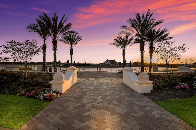 view of patio terrace at dusk