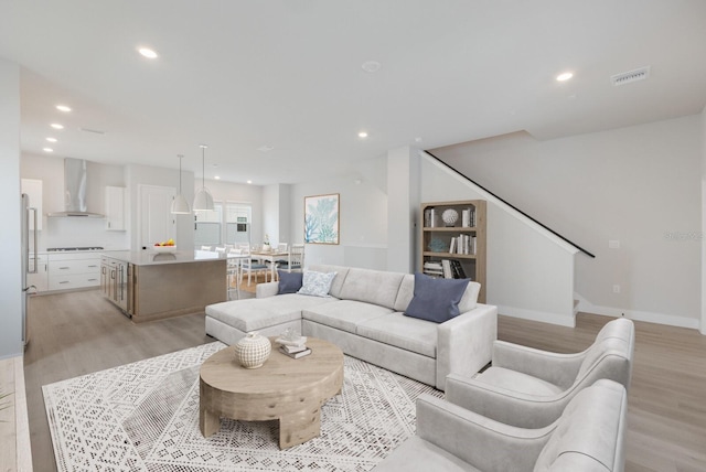 living room featuring light wood-type flooring