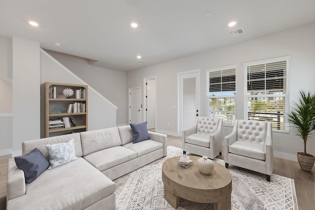 living room with light hardwood / wood-style floors