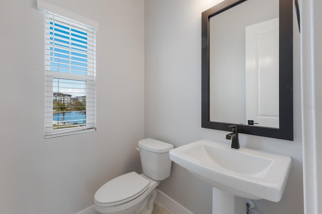 bathroom with sink and toilet