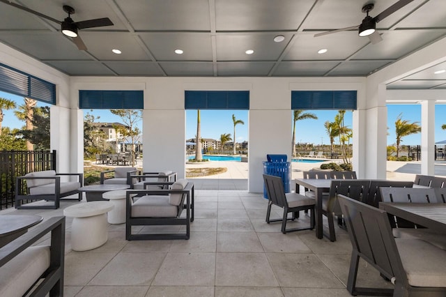 view of patio featuring ceiling fan