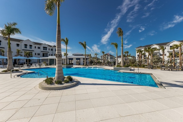 view of swimming pool featuring a patio