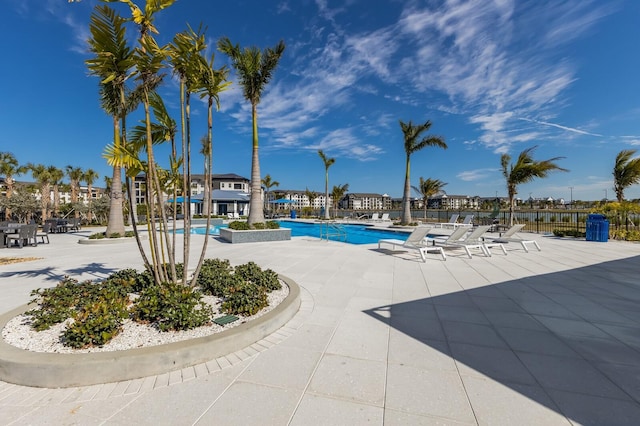 view of swimming pool featuring a patio