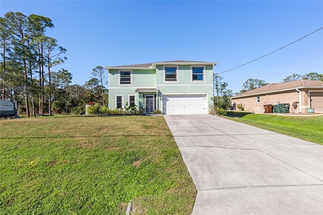 view of front of house with a garage and a front lawn