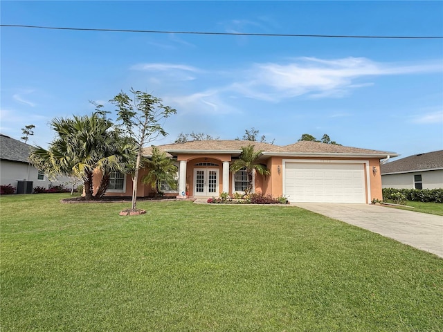 single story home with french doors, central AC unit, a front yard, and a garage