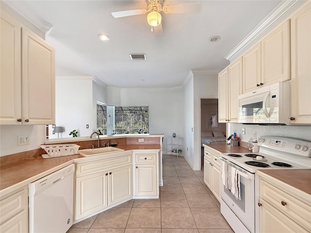 kitchen featuring ornamental molding, white appliances, ceiling fan, sink, and light tile patterned floors