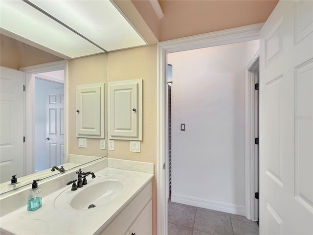 bathroom with tile patterned flooring and vanity