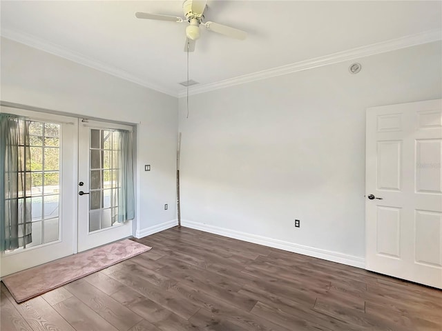 spare room with french doors, dark hardwood / wood-style flooring, ceiling fan, and ornamental molding