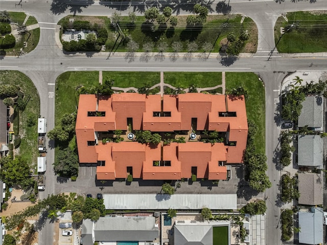 birds eye view of property with a residential view