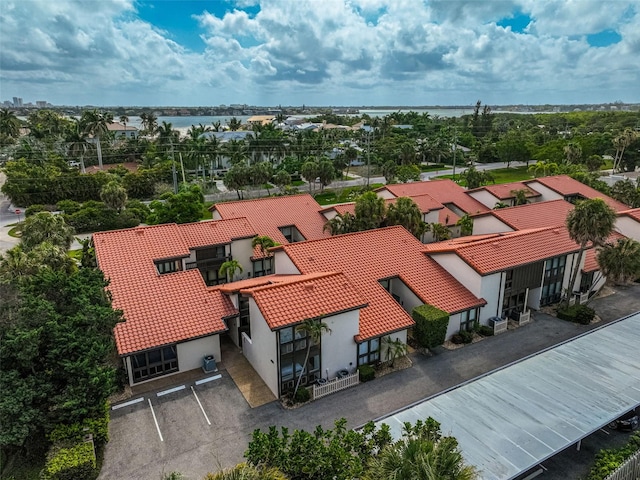 birds eye view of property with a residential view