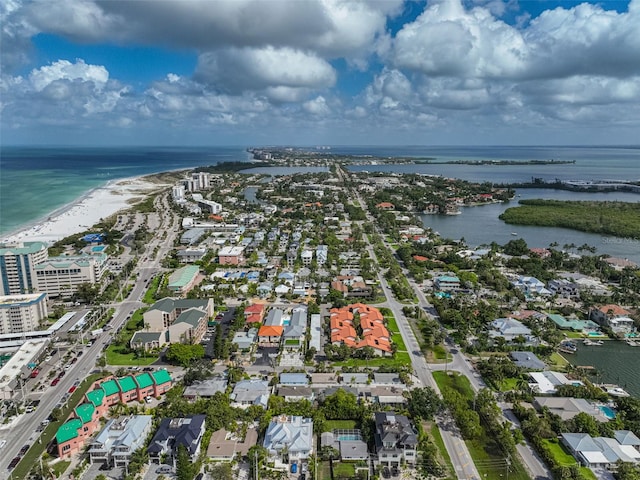 bird's eye view with a beach view and a water view