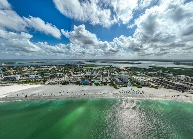 aerial view with a water view, a view of city, and a view of the beach