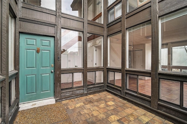 800 S Blvd Of Presidents Unit 12, Sarasota, FL 34236 - unfurnished sunroom with healthy amount of natural light