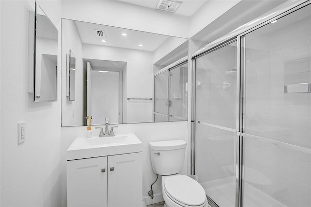 800 S Blvd Of Presidents Unit 12, Sarasota, FL 34236 - bathroom featuring vanity, a stall shower, and recessed lighting