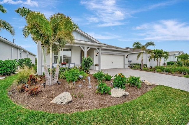 ranch-style home featuring a garage