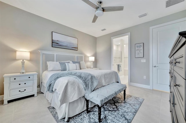 bedroom featuring ensuite bathroom and ceiling fan