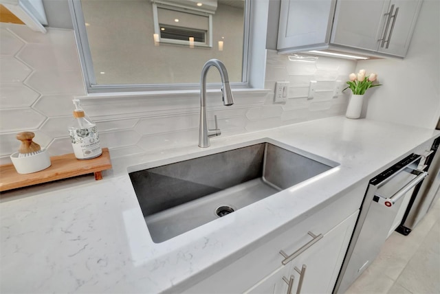 kitchen with sink and decorative backsplash