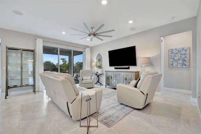 living room with ceiling fan