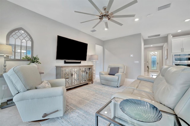 living room featuring ceiling fan