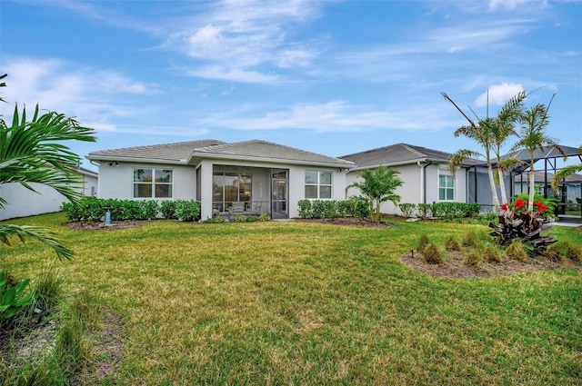 view of front of property with a front lawn