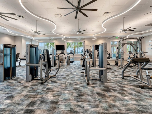 workout area featuring a drop ceiling