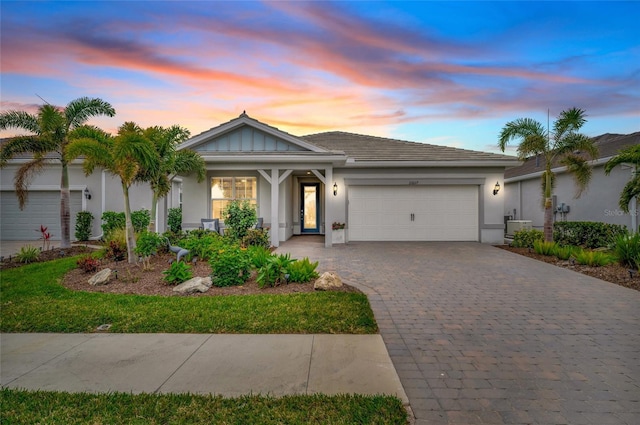 view of front of house with a garage