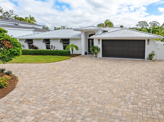 view of front of house with a garage