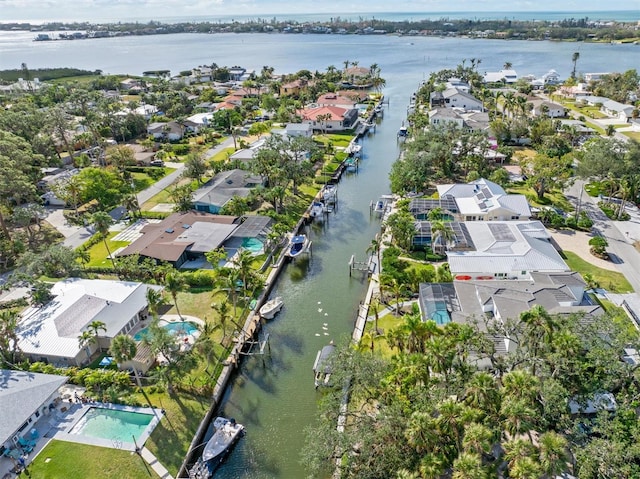 bird's eye view with a water view