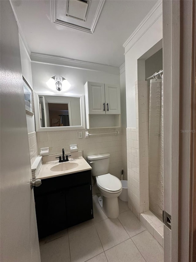 bathroom with tile patterned flooring, vanity, a shower with shower curtain, and tile walls