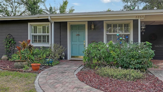 doorway to property featuring a porch