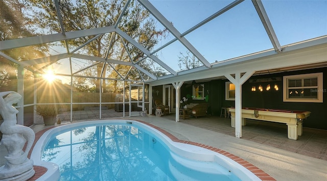 view of pool featuring a lanai, a fenced in pool, a patio area, and fence