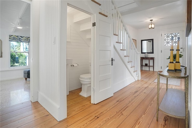 interior space with toilet and wood-type flooring