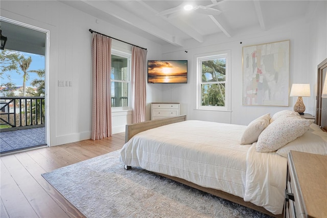 bedroom with access to outside, beam ceiling, ceiling fan, and wood-type flooring