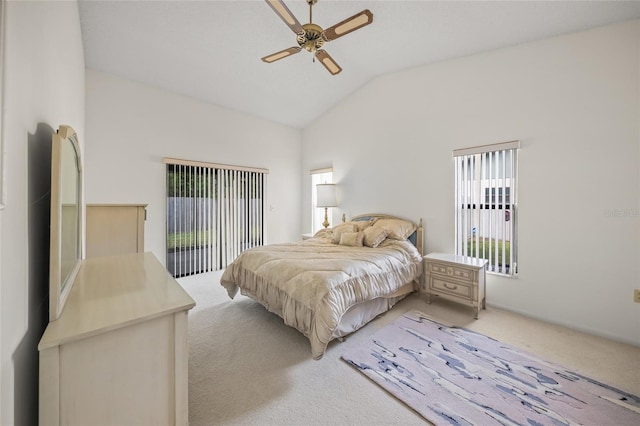 bedroom with access to exterior, ceiling fan, light carpet, and vaulted ceiling