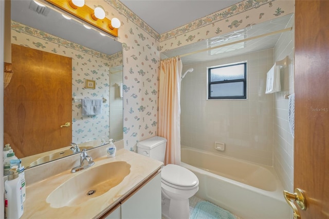 full bathroom featuring toilet, vanity, and shower / tub combo with curtain